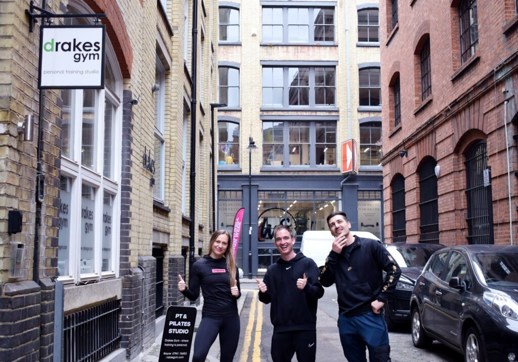 Team Drakes smiling outside the gym at 1 Pardon Street,  London EC1V 0LR